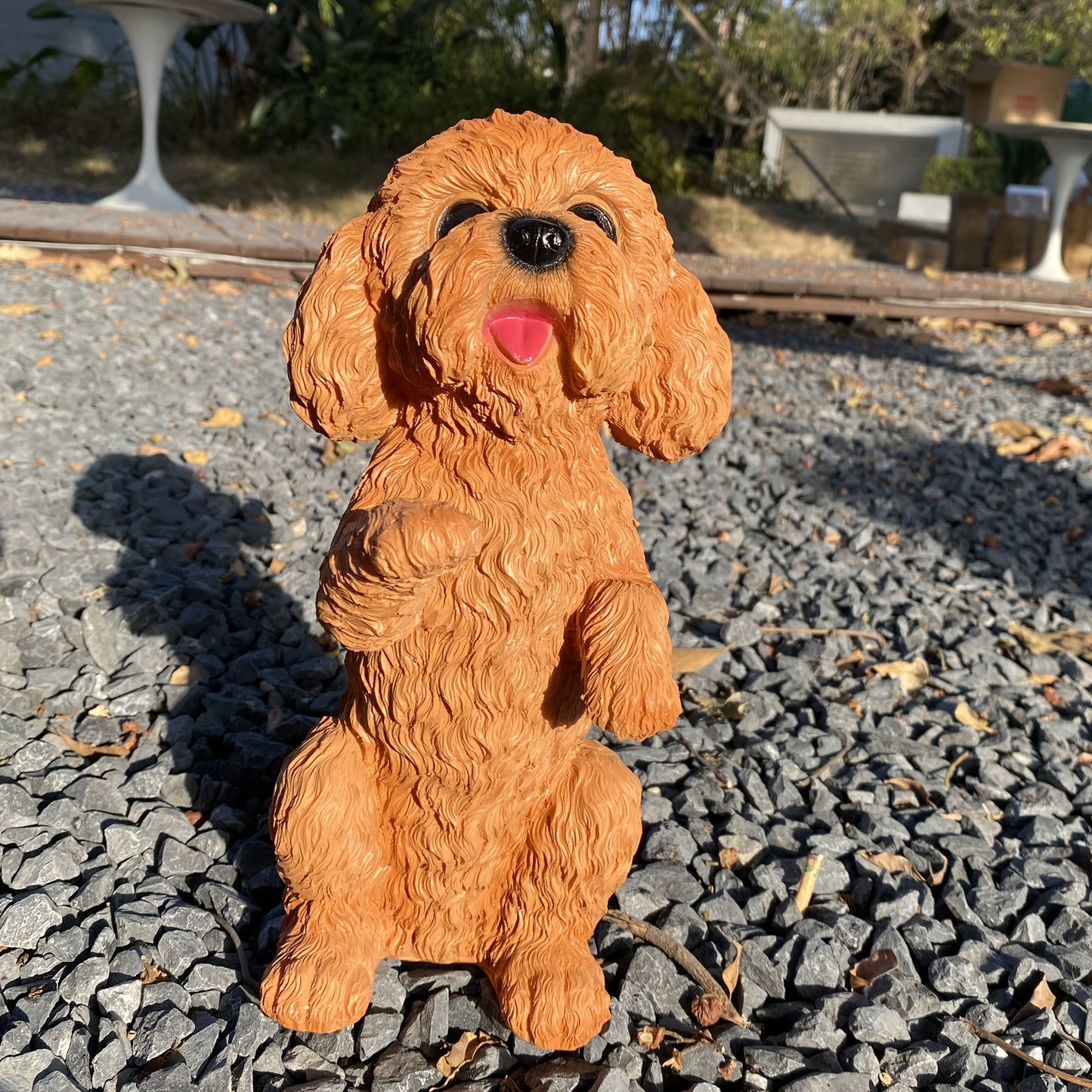 A Lifelike Brown Teddy Dog Figurine, Perfect for Garden Outdoor Decoration And Yard Embellishment.